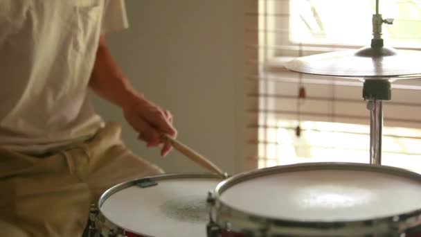 Drummer Practicing Ghost Note Natural Light Coming Window Angled Top — Vídeo de Stock