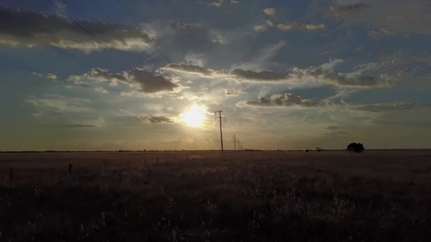 Silhouette Overhead Power Supply Line Rural Desolate Area Aerial Forward — 图库视频影像