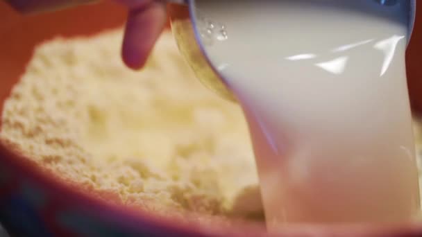 Pouring Cup Milk Bowl Flour Slow Motion — Wideo stockowe