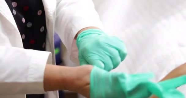 Doctor Putting Latex Gloves — Stok video