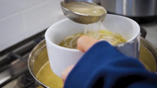 Cook Adding Broth Noodle Soup — Stok video