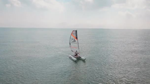 Man Sailing His Catamaran Sea Drone Flies Pans Beautiful Coastal — Stok video