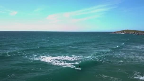 Surfer Catching Wave Blue Waters Wide Drone Shot — 图库视频影像