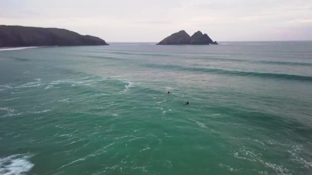 Two Surfers Make Way Out Sea Coming Waves Drone Shot — Stockvideo