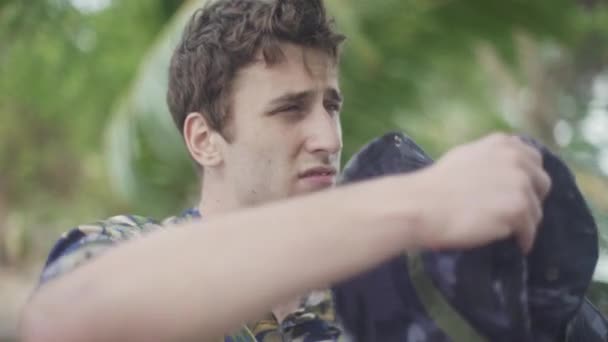 Young Explorer Lost Tropical Jungle Scratches His Head Uncertainty — Stockvideo