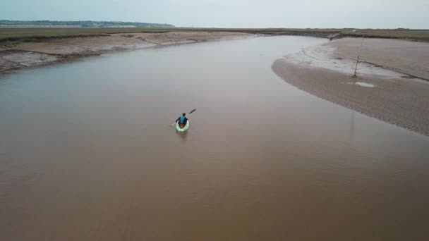Man Kayaking Meandering River Drone Pans Kayaker — Stock video