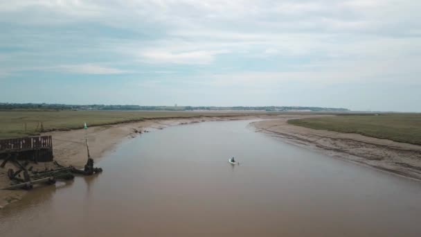 Man Kayaking Meandering River Drone Follows Beautiful Landscape Background — Stok video