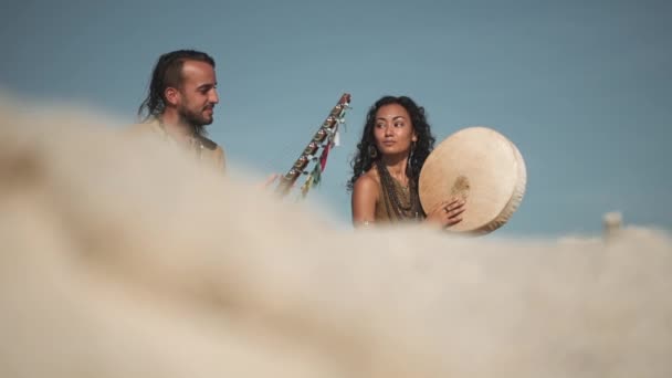 Ethnic Musicians Man Woman Playing Stringed Drum Dessert Siting White — Vídeo de Stock