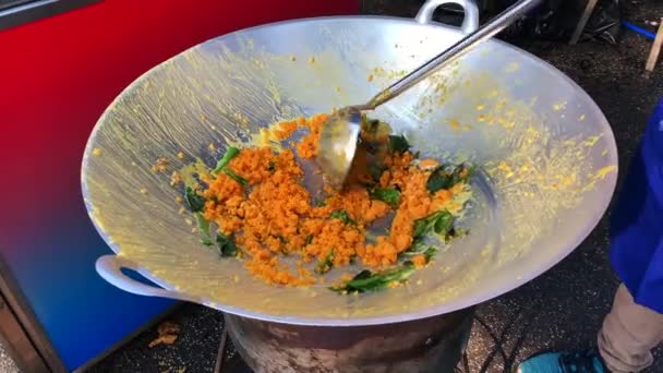 Vendor Face Shown Stir Frying Egg Yolk Herbs Mix Using — 图库视频影像