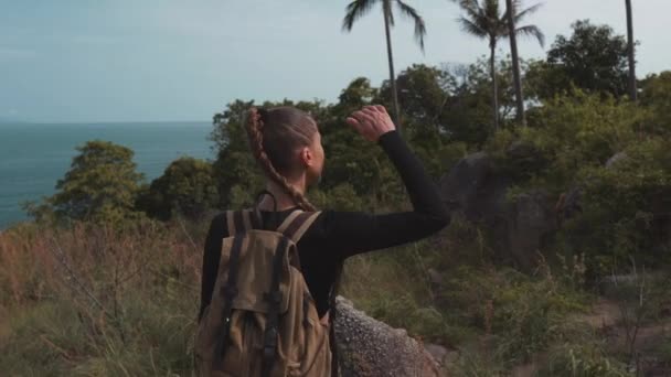 Blonde Hiker Girl Walks Mountain Looks Covering Her Eyes Hand — Stock video