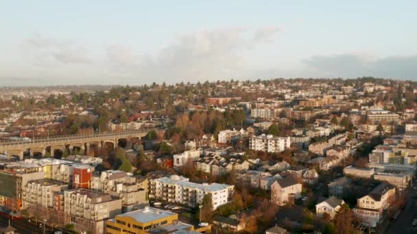 Drone Aerial Push towards Fremont neighborhood during sunrise.; going into neighborhood with houses and apartments. Seattle, WS