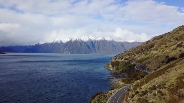 Aerial Shot New Zealand Panning Shot Road Coast Snowy Mountains — стоковое видео