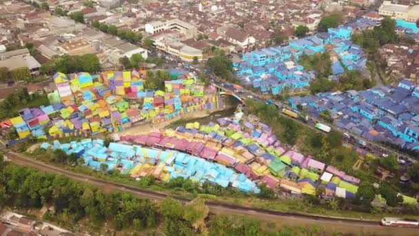 Colorful Village Air Flight While Train Passing Moody Day East — Vídeo de Stock