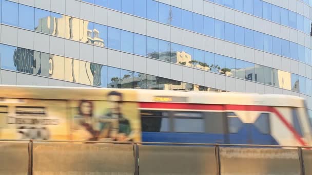 Commercially Designed Passenger Train Passing Bangkok Thailand Building Background Wide — Stockvideo