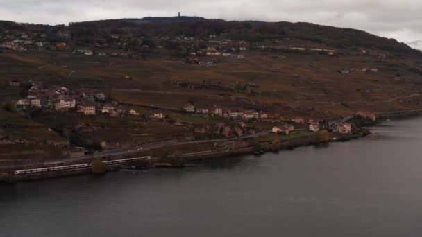 Wide Aerial Train Driving Railway Small Village Hills — Vídeos de Stock