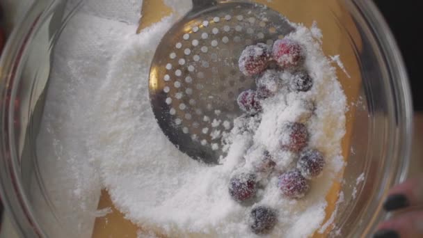 Slow Motion Overhead Metal Strainer Sifting Bright Red Cranberries Sugar — Stock video