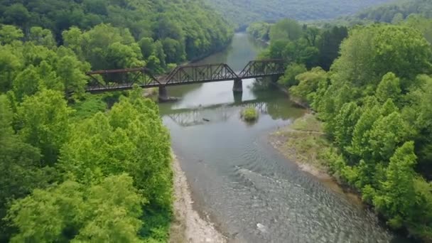Aerial Drone Flying Blue River Adventurous People Kayaks Alongside Bright — Stockvideo