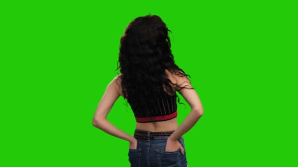 Beautiful Fit Female Holds Hands Pockets Turns Green Screen — 图库视频影像