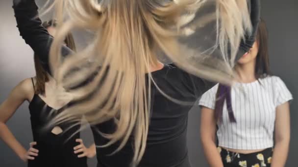 Long Haired Blonde Woman Adjusts Makes Her Hair Flyaway Front — Stok Video