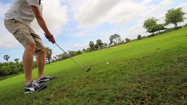 Young Caucasian Man Walks Practices His Golf Swing — Wideo stockowe