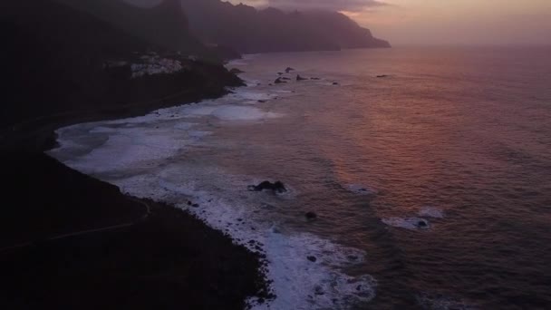 Aerial Revealing Shot Volcanic Cliffs Tenerife Waves Splashing Sunset — ストック動画