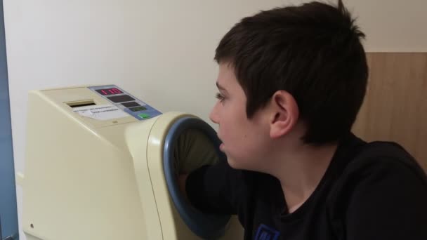 Young Boy Has His Arm Blood Pressure Machine Handheld — Vídeo de stock