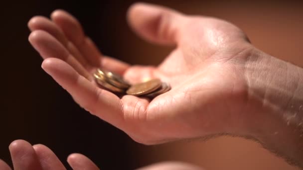 Slow Motion Coins Being Transferred One Hand Other Close Shot — Stock videók