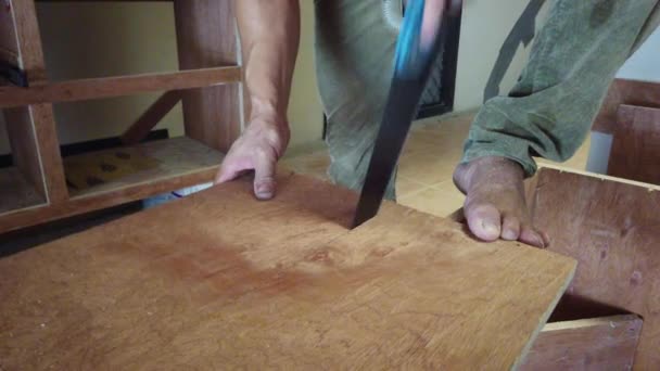 Face Close Man Hand Sawing Plywood His Foot Side — Stock Video