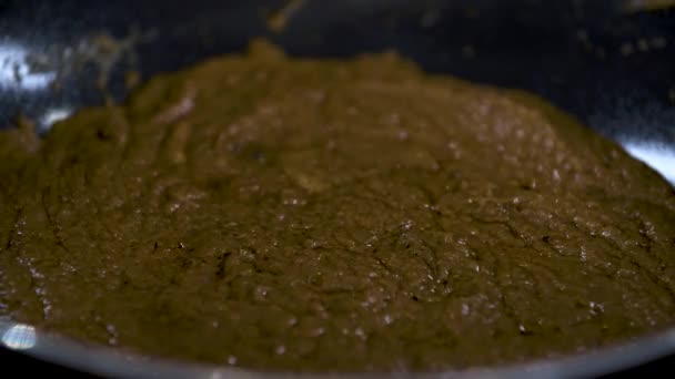 Pouring White Coconut Milk Can Sizzling Brown Massaman Curry Paste — Stock Video