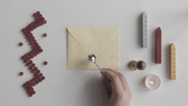 Close Hand Putting Melted Red Wax Letter Envelope — Stockvideo