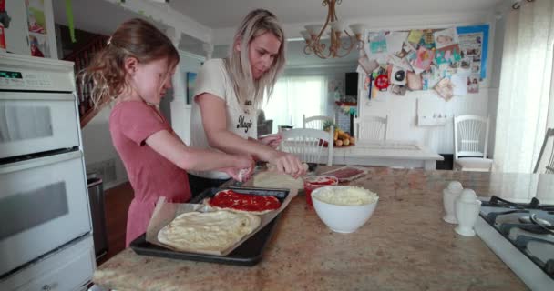 Mother Daughter Have Great Time Putting Together Homemade Pizza — Stock Video