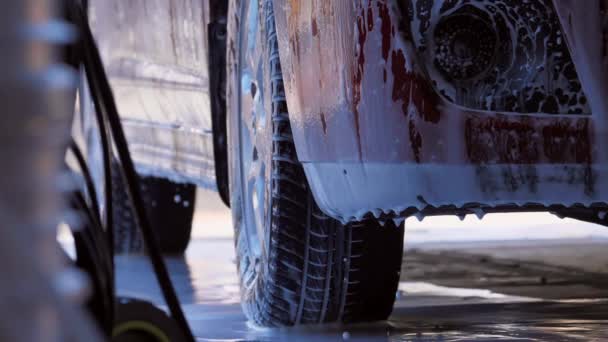 Soap Drips Vehicle Tires Being Spray Washed Soap Slow Motion — Stockvideo