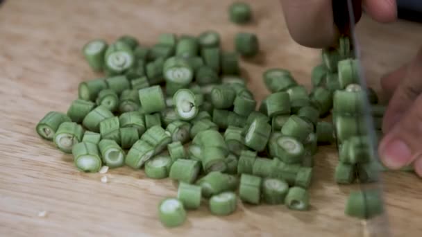 Cutting Green Long Beans Small Pieces Knife Wooden Chopping Board — Stock video