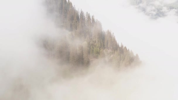 Aerial Mountain Top Rising Bright Clouds — стоковое видео