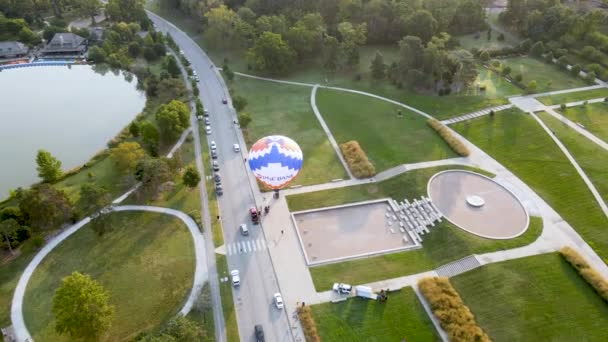 Hot Air Balloon Ground Festival Aerial Drone Orbiting Overhead — ストック動画