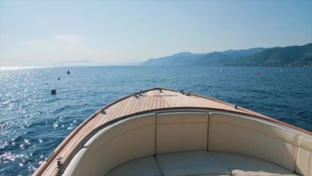Small Boat Slowly Floating Calm Sea Daylight Mountains Background Portofino — Stockvideo