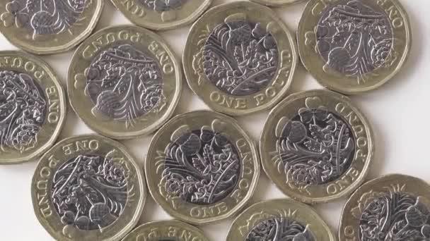 Flat Lay British One Pound Coins White Background Closeup Shot — Video