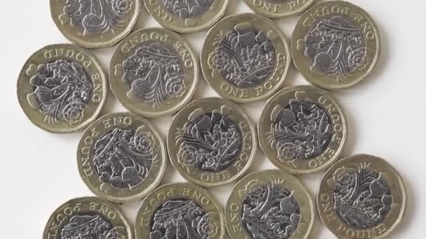 Rotating Reverse 2017 British Pound Coins Laid Flat White Surface — Wideo stockowe