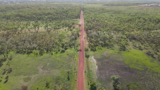 High Slow Moving Aerial Drone Shot Long Straight Red Road — Vídeo de Stock