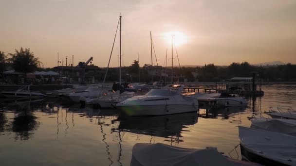 Serene Scenery Small Lake Garda Port Sunset Shiny Water Surface — Stock Video