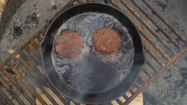 Close Overhead View Veggie Burgers Cooking Hot Black Iron Skillet — Video