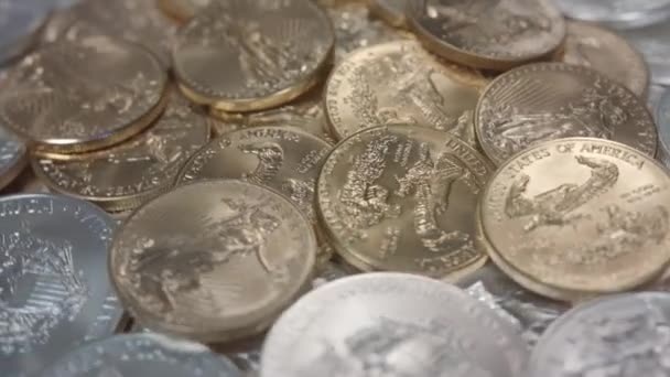 American Gold Eagles Coins Pile Silver Coins Spinning Left — Stock Video