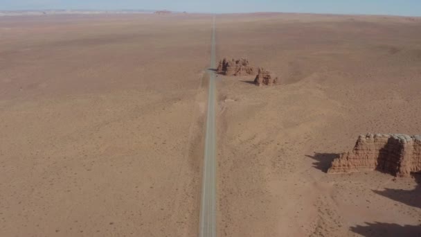 Aerial View Going Desert Road Small Rock Group Formation Side — Vídeos de Stock