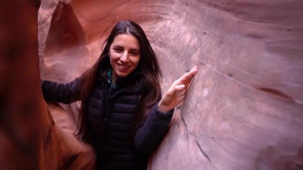 Young Happy Female Hiker Works Her Way Tight Slot Canyon — Stockvideo
