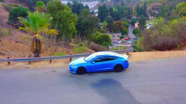 Panning Looking Blue Tesla Model Looking Los Angeles Skyline Beautiful — Stock videók