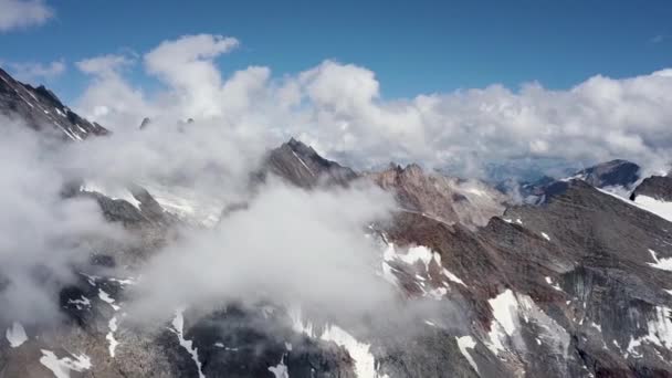 Aerial Dolly Out Montain Range Clouds Sunny Summer Day Snow — Video Stock