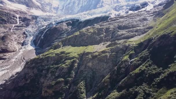 Aerial Side Traveling Swiss Alps Glacier Awaterfall — Wideo stockowe