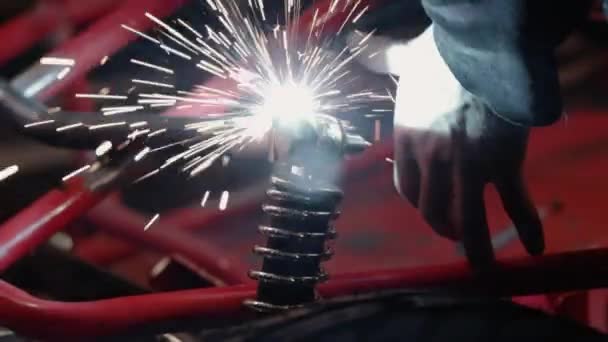 Bright Light Being Cast Welding Metal Together Vehicle Suspension — Vídeo de Stock