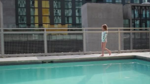 Young Girl Walks Urban Rooftop Pool City — 图库视频影像