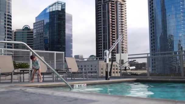 Young Girl Has Great Time Jumping Pool Urban Rooftop Luxury — 비디오